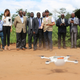 Malawi’s minister of health, Peter Kumpalume, UNICEF’s representative Mahimbo Mdoe, and other officials from Ministry of Health watch the launch of a drone delivering simulated HIV tests.